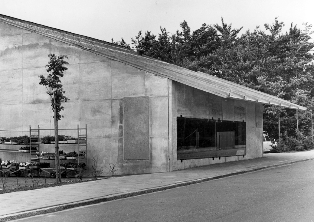 Exterior view of a low concrete building